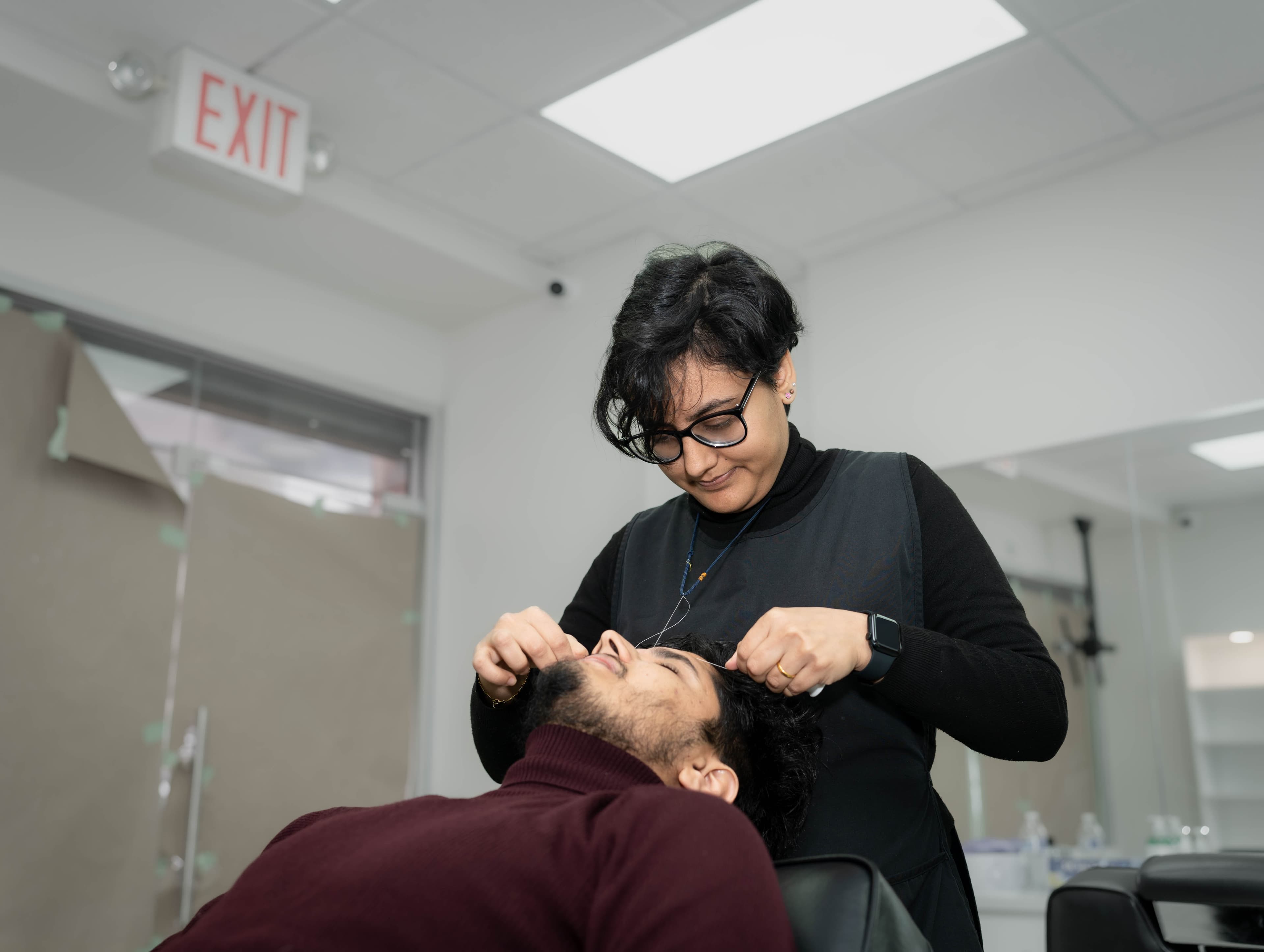 Precision eyebrow threading at Brows & Lashes by UniqSwek