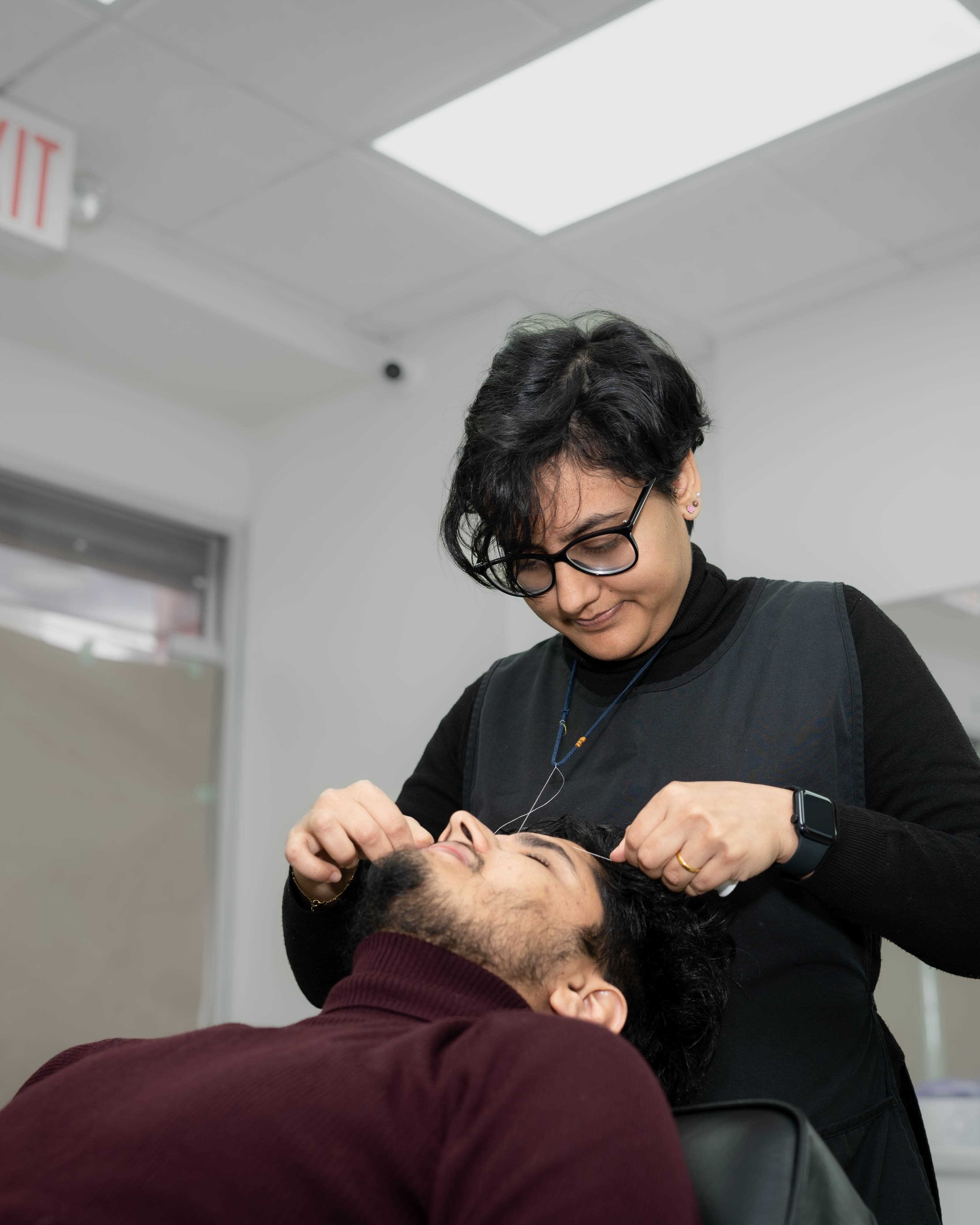 Swekchha Luitel threading a client